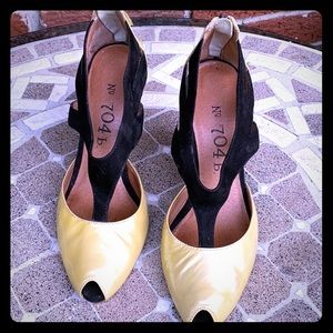 Stylish open toe shoe with zipper in back.  7 1/2